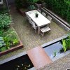 levensloop-stadstuinontwerp-nijmegen-vogelvluchtfoto-achtertuin-met-eetterras-en-strakke-vijver