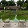 Villa tuin met zwemvijver